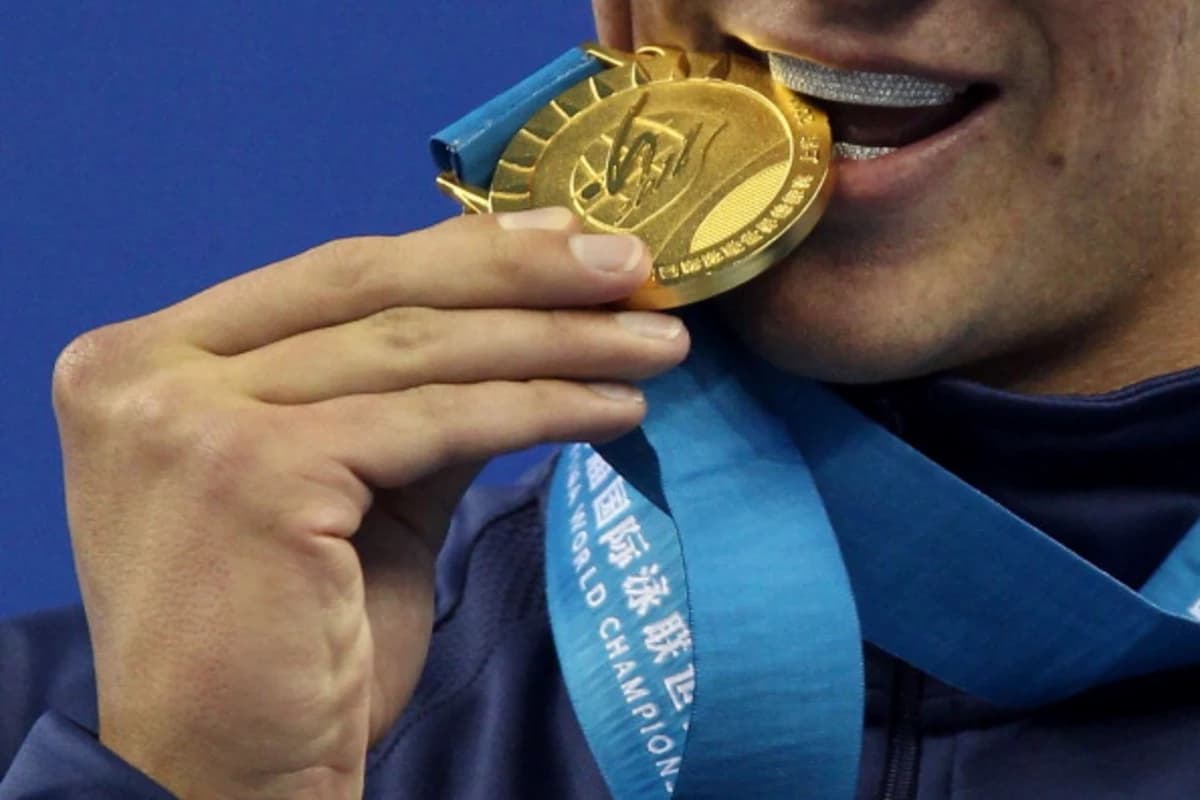 Why Olympic Winners Bite their Medals?